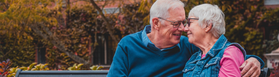 Moneta Health- Older couple on park bench